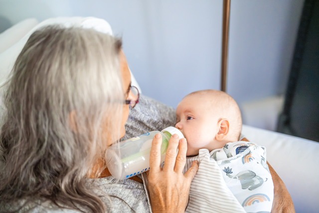 Linda Feeding a Baby With Milk